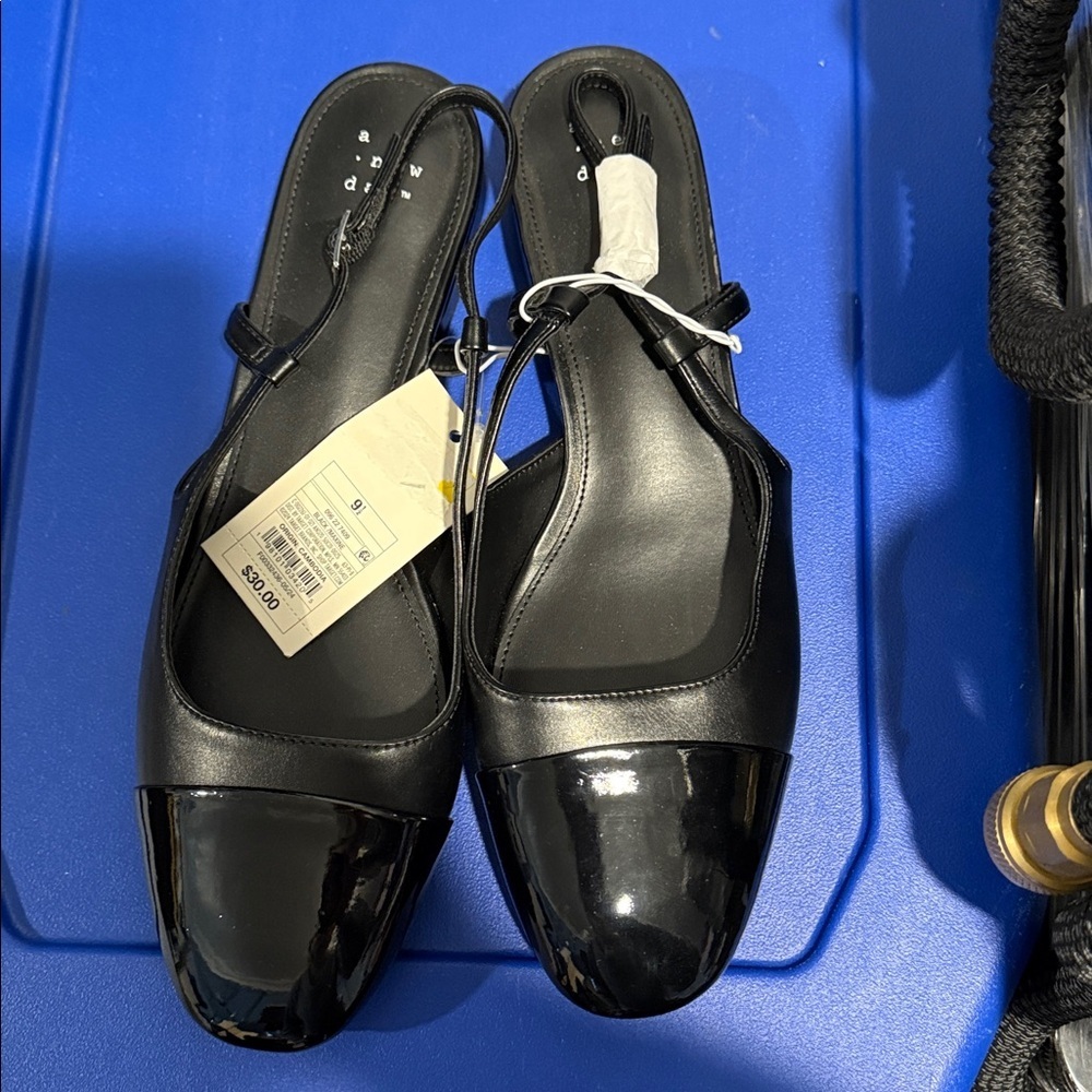 Black sling back flats
